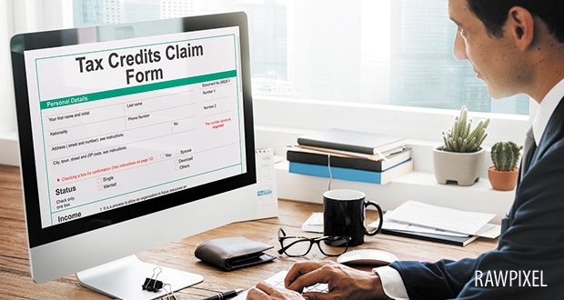 Tax Credits Claim Return Deduction Refund Concept