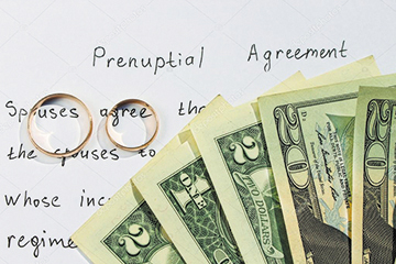 depositphotos_82146186-stock-photo-two-wedding-rings-and-dollars-1